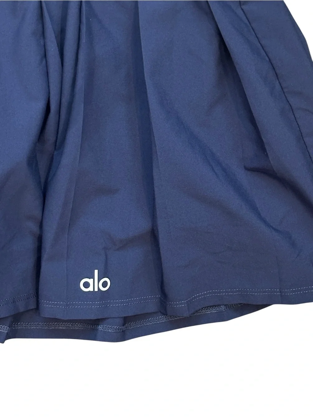 Alo Yoga Varsity Pleated Mid Rise Mini Tennis Skirt in Navy Blue Women’s Medium
